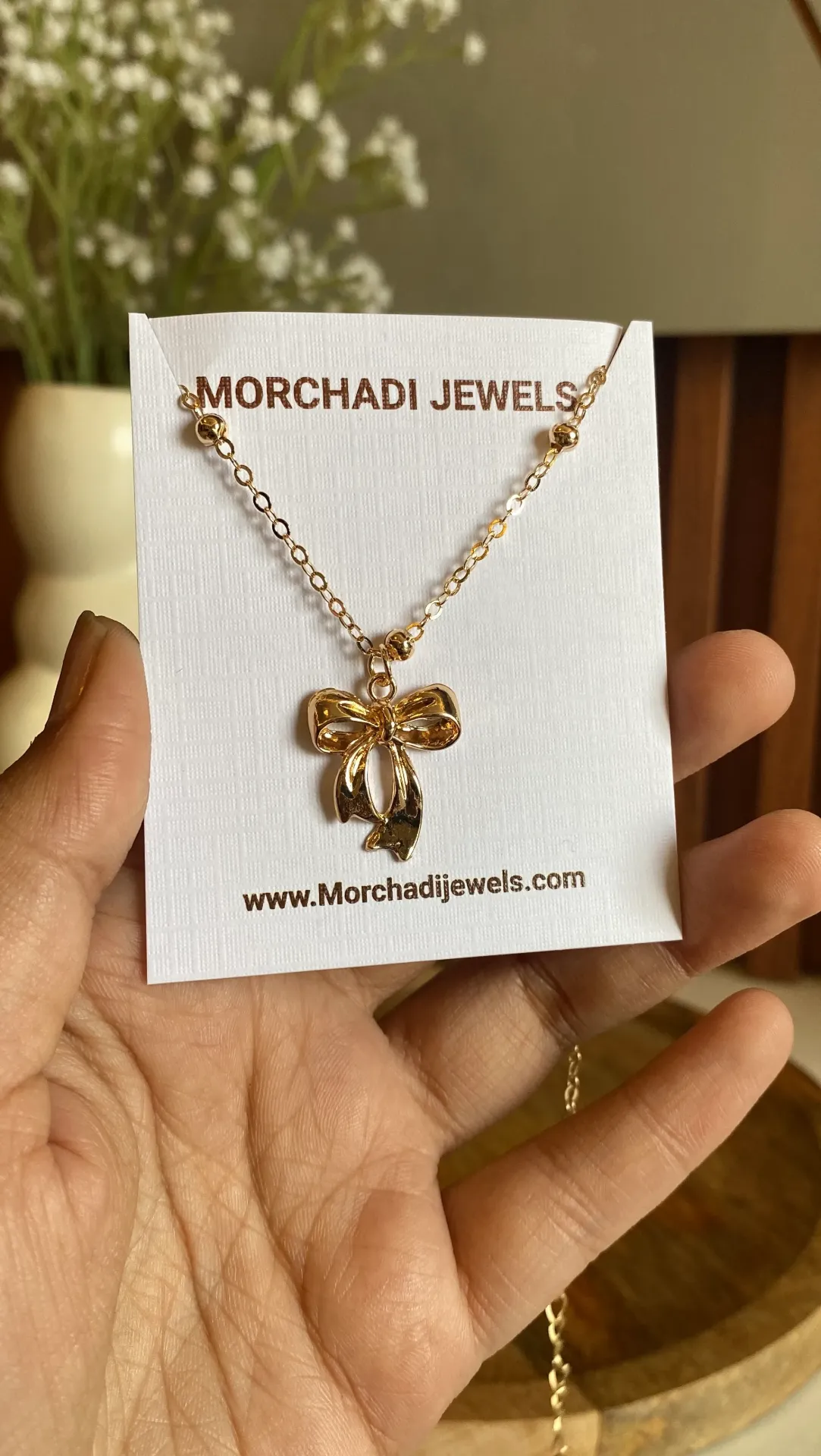 Gold Beaded Chain Bow Necklace