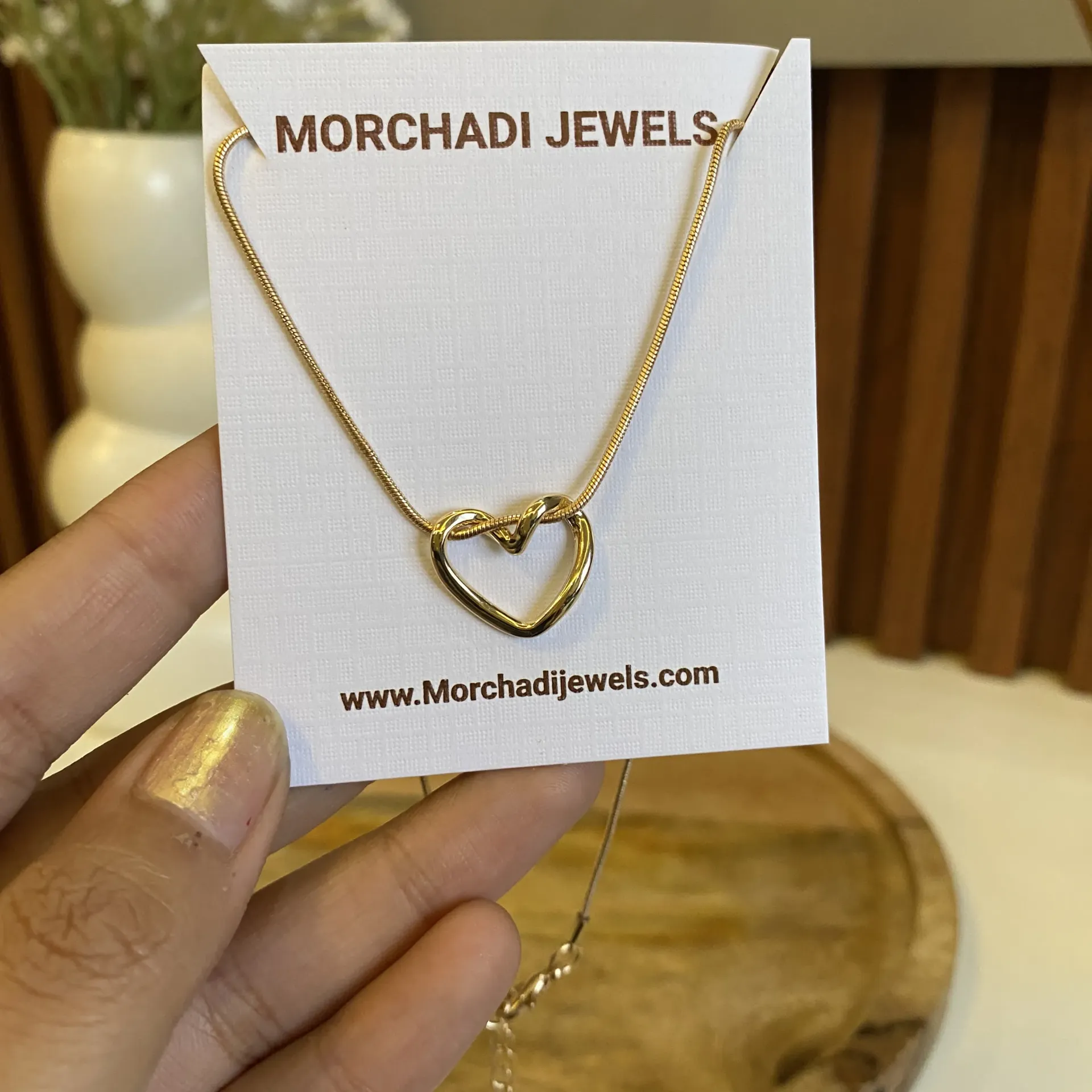 Gold Intertwined Heart Knot Necklace