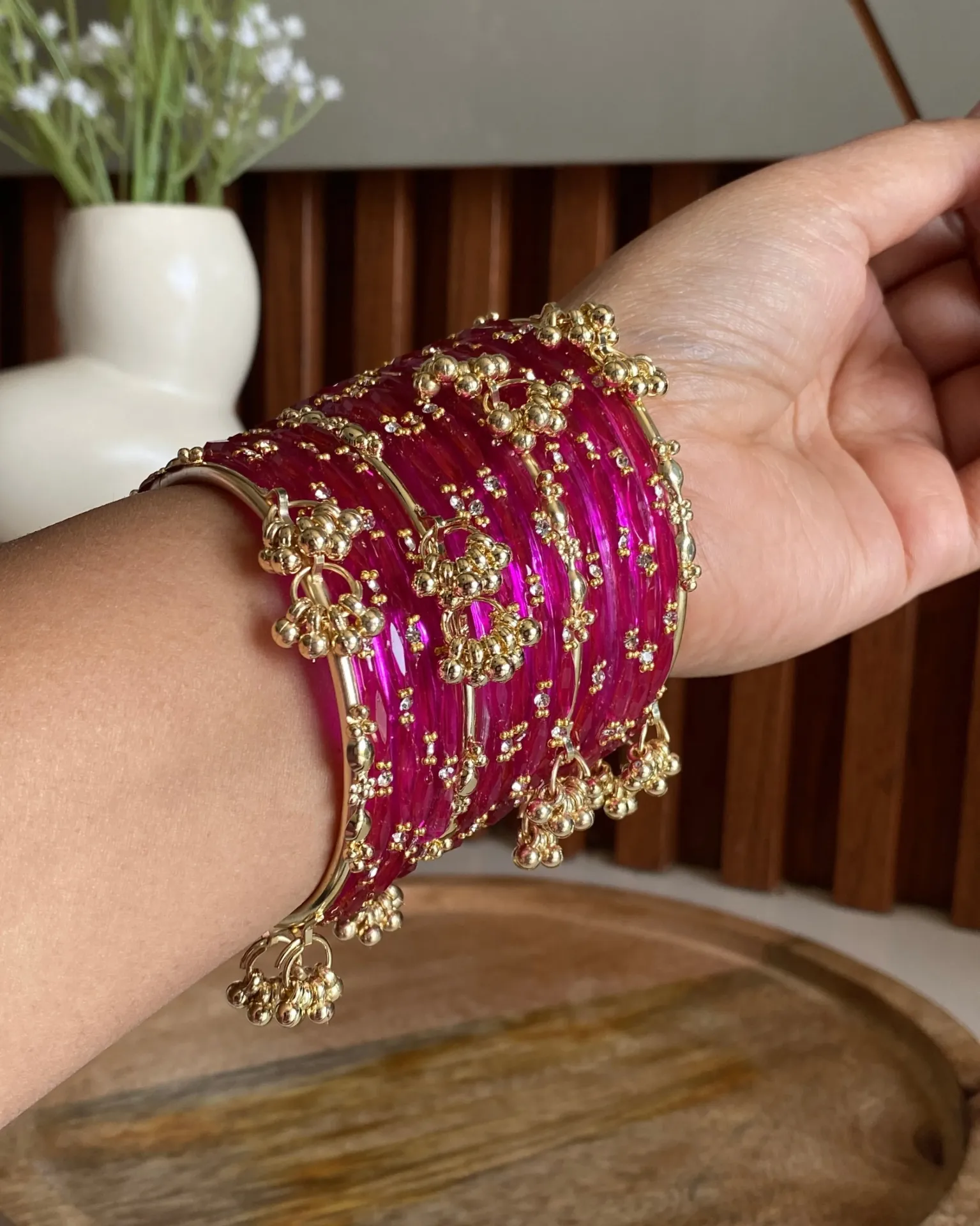 Vibrant Pink Glass Bangle Set with Golden Ghoonghroo Accents – 16-Piece