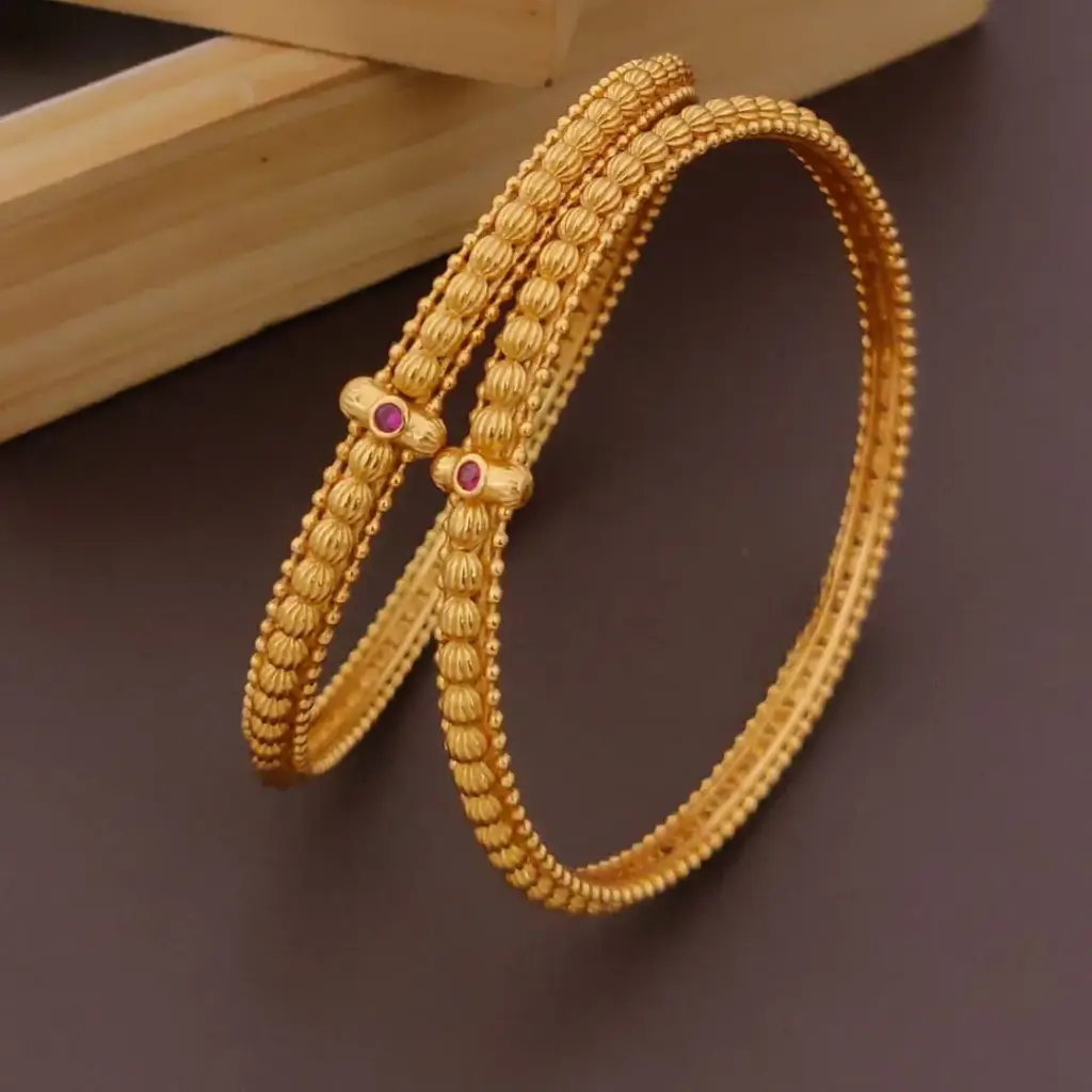 Textured Gold-Plated beaded Bangles with Pink Stone Accent 